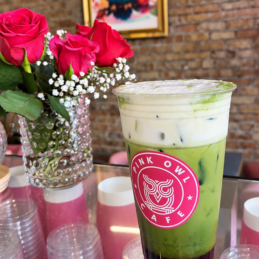 Layered strawberry matcha latte with cold foam